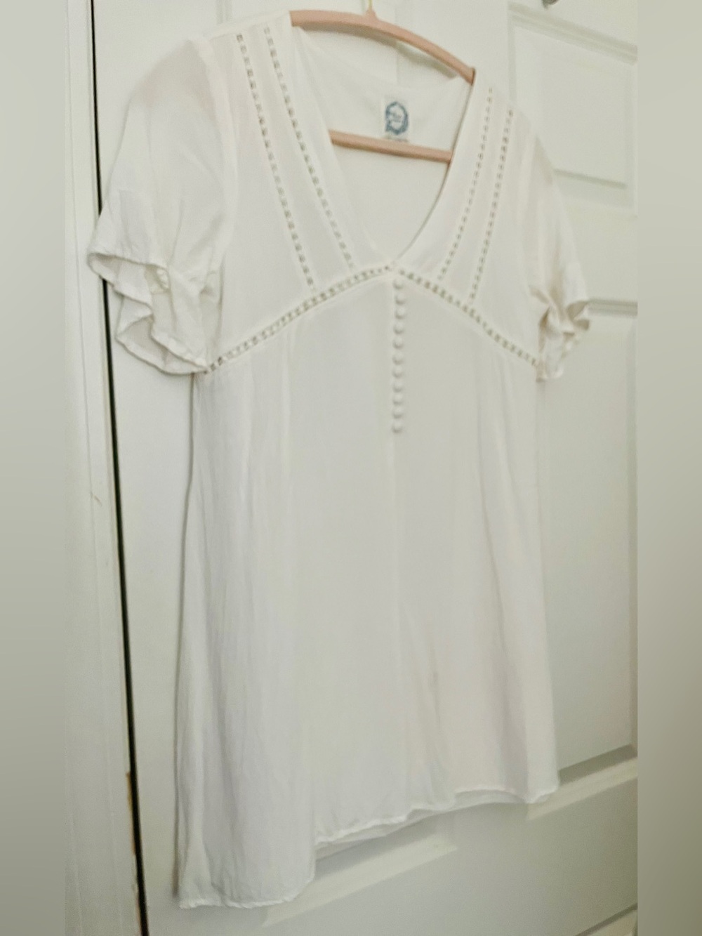 Blue Rain Francesca’s White V-Neck Button-Detail Babydoll Dress